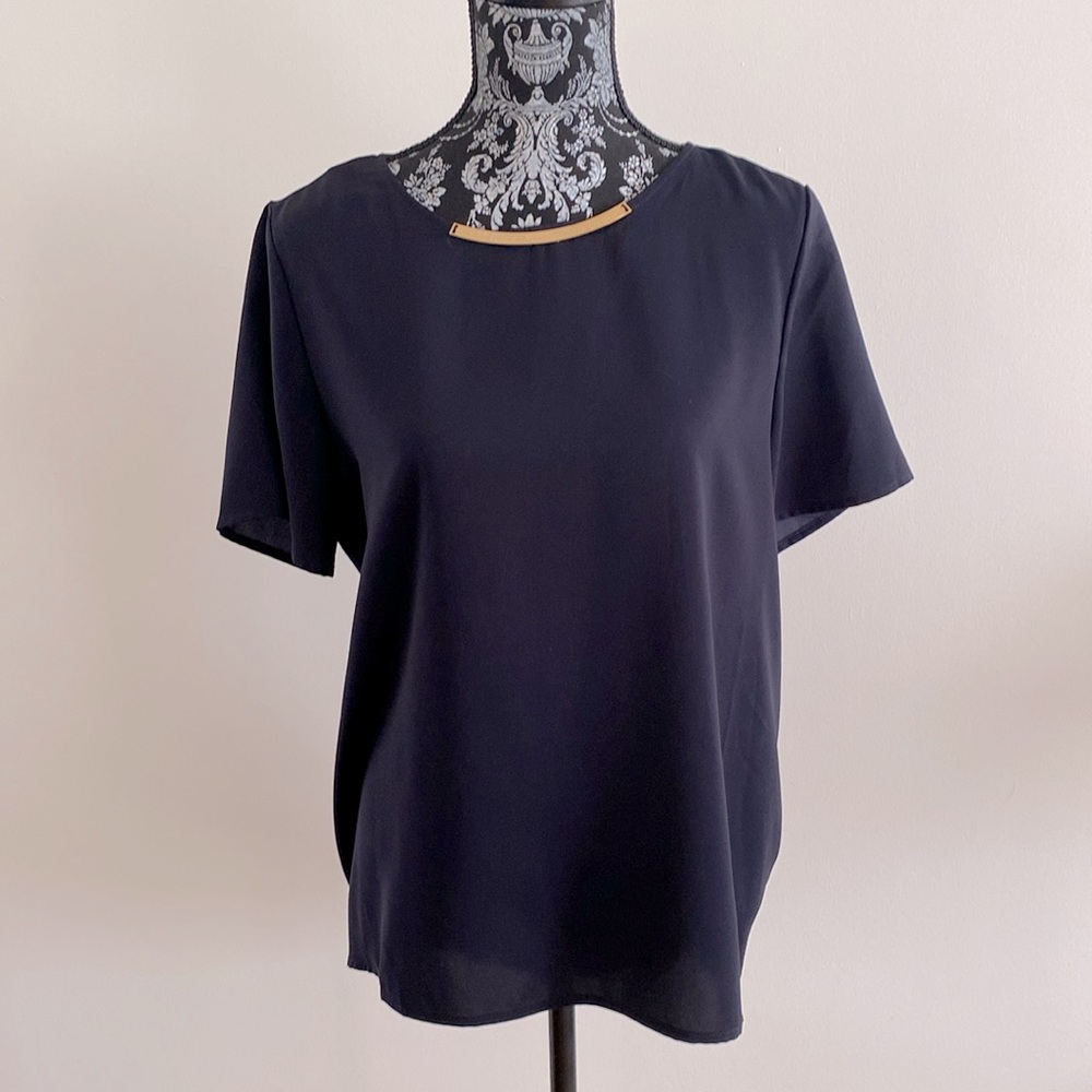 Michael Kors navy blue top size 10 with gold detailing around neck and train